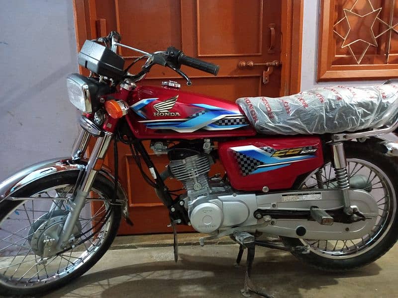 HONDA CG 125 model 2024 karachi numbr frist owner 7