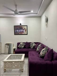 One-bedroom fully furnished apartment with a lounge and kitchen.