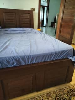 single bed with pair of side tables