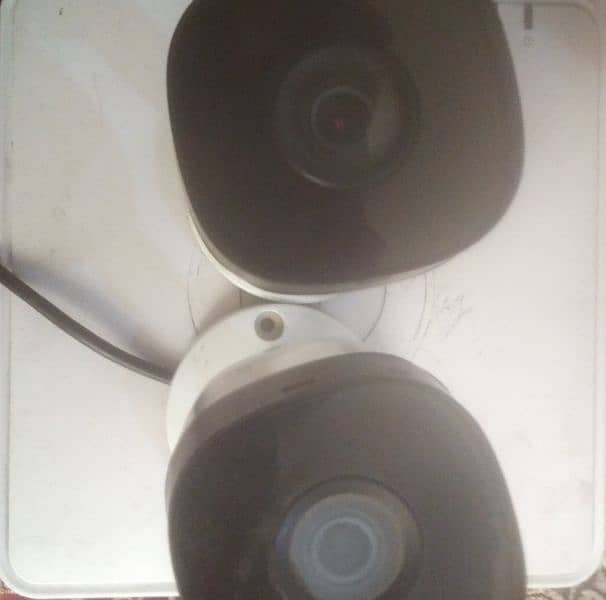 2 CCTV Cameras + Hikvision 4 channels DVR 2