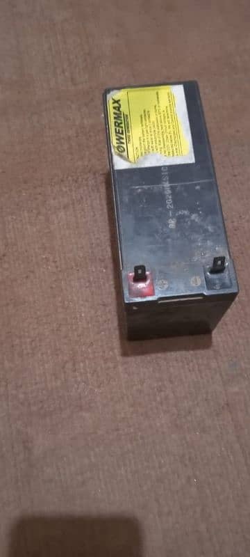 Battery 12 VOLT (07 ampere) with charger 0