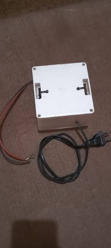 Battery 12 VOLT (07 ampere) with charger 1