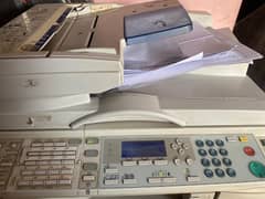 Ricoh mp 2000 photo state machine