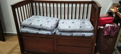 baby cot also use as a sofa