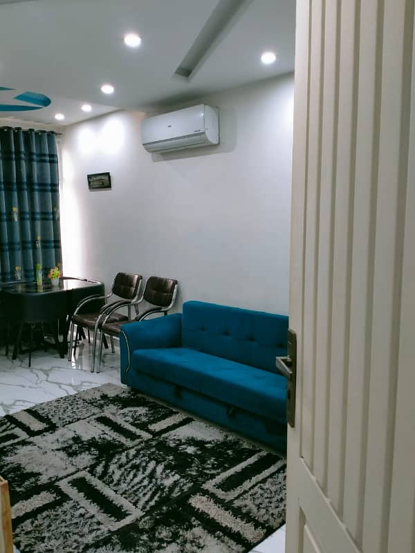 1 BED LIKE A NEW FULL LUXURY IDEAL EXCELLENT FULL FURNISHED FLAT FOR RENT IN BAHRIA TOWN LAHORE 0