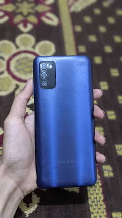 I'm selling my Samsung A03s with box 4/64 pta approved