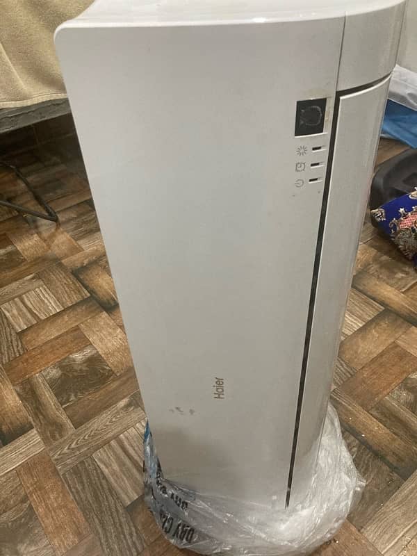 Haier 1 ton AC   DC inverter . 5