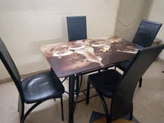 Used Dinning table and 4 chairs