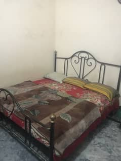 Bed with side tables and showcase ,steel cupboard  and iron stand