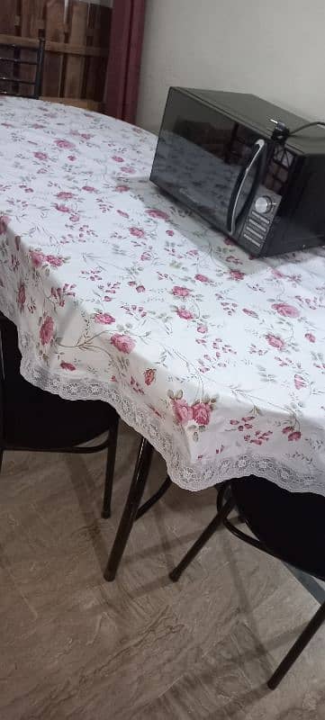 Glass Dining Table with six chairs. (used) 8/10 condition. 2