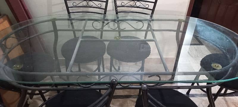 Glass Dining Table with six chairs. (used) 8/10 condition. 4