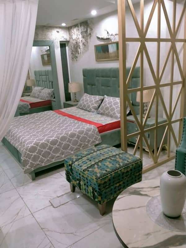 STUDIO BRAND NEW FULL LUXURY FULLY FURNISHED FLAT FOR SALE IN BAHRIA TOWN LAHORE 0