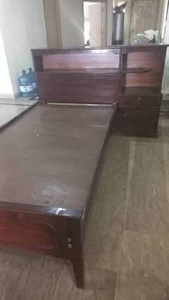 Single bed with side table