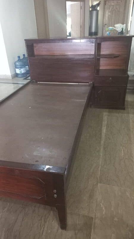 Single bed with side table 0