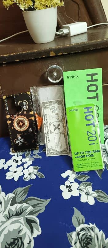 infinix hot 20i 4+3 /64 gb ram with box charge. no open no repair 2