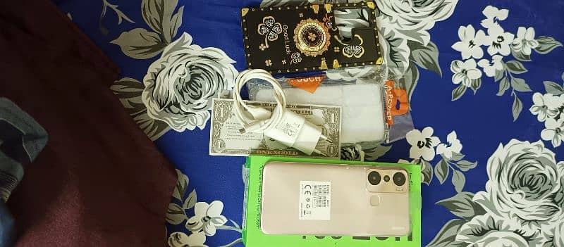 infinix hot 20i 4+3 /64 gb ram with box charge. no open no repair 7