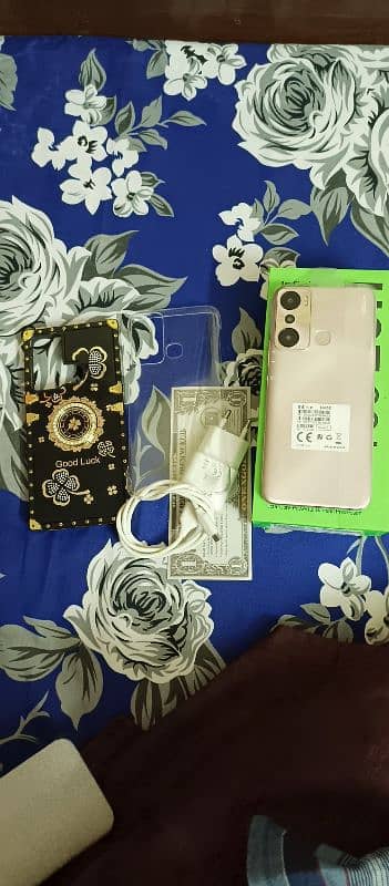 infinix hot 20i 4+3 /64 gb ram with box charge. no open no repair 8