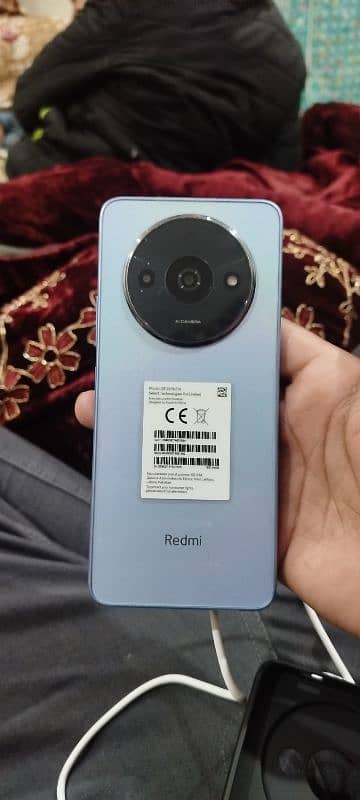 redmi A3 fox and charger available 10 by 10 condition urgent sale 2