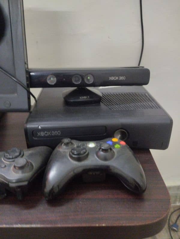 XBOX 360 WIth 2 CONTROLLER'S AND KINECT motion sensor CONTROL 0