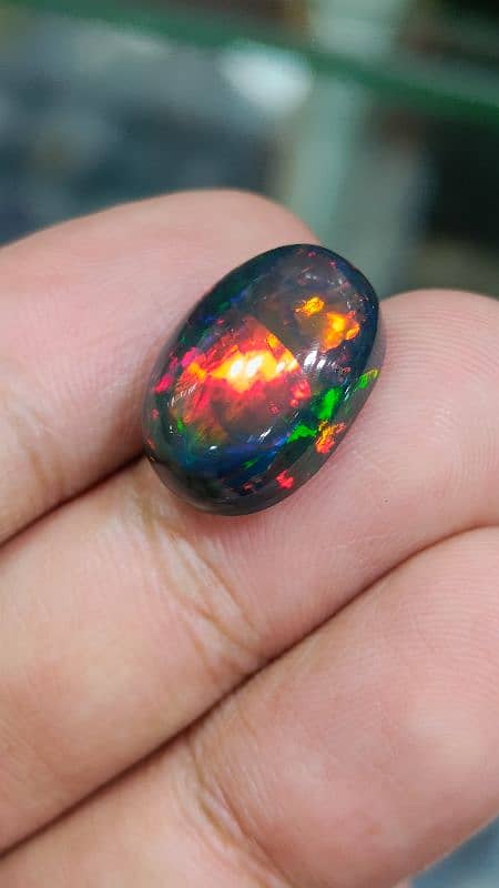 Galaxy Black Opal full fire multi color natural big size opal for sale 2