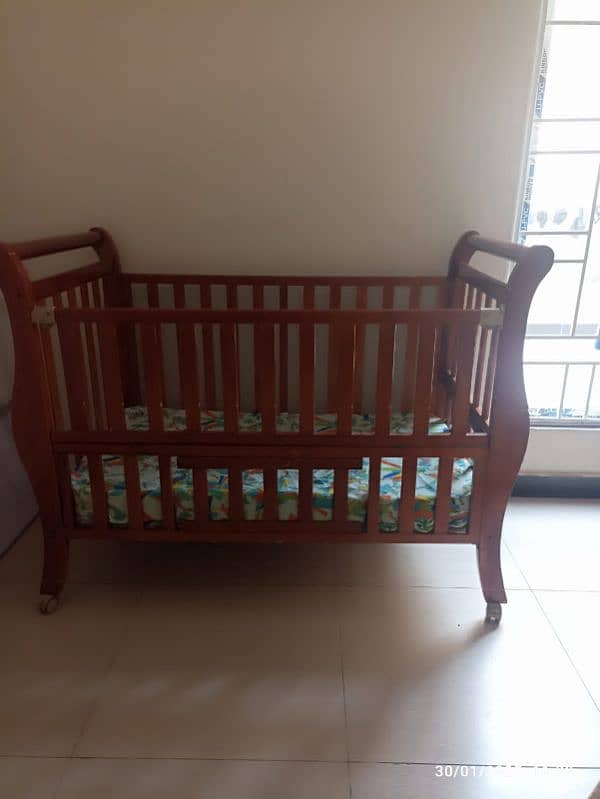 Zubaida's wooden baby cot with mattress 0