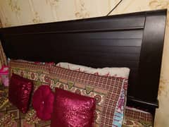 dark brown colour king size bed.