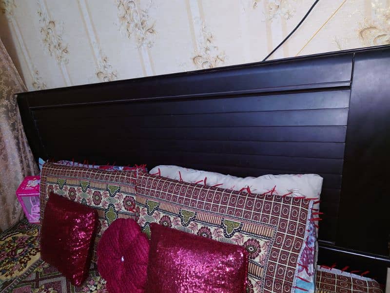 dark brown colour king size bed. 1