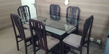 Wooden dining table with 6 chairs for sale