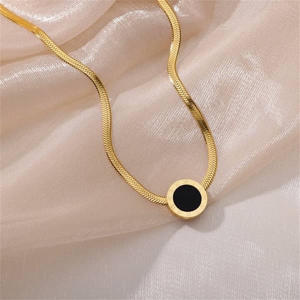 Gold black circle pendant 1