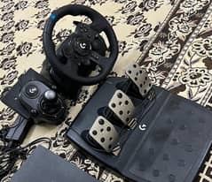 Logitech G29 Racing wheel with gear shifter & pedals.