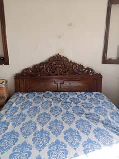 brown color royal bed.