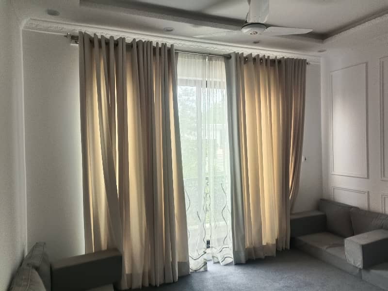 MODEL TOWN L BLOCK 10MARLA FULLY FURNISHED UPER PORTION FOR RENT HAVING 3BED,2BATH,LAOUNGE,KITCHEN,BED,SOFAS,AC,UPS,CURTAINS,ALL ASSESORIES INSTALLED 14