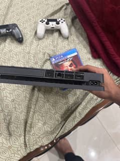 ps4 with a controller and taken 7 cd