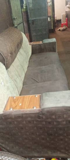 6 seaters sofas in good condition with covers free gift.