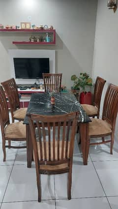 Dinning Table with 6 chairs and marble tob in Brand new condition