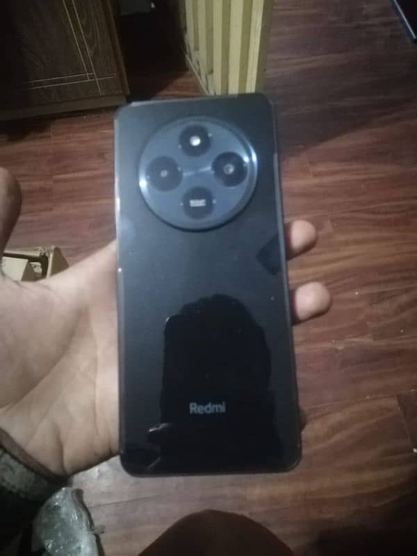 redmi mobil 14c 2 months used sale on OLX  6/128 with box charger 2