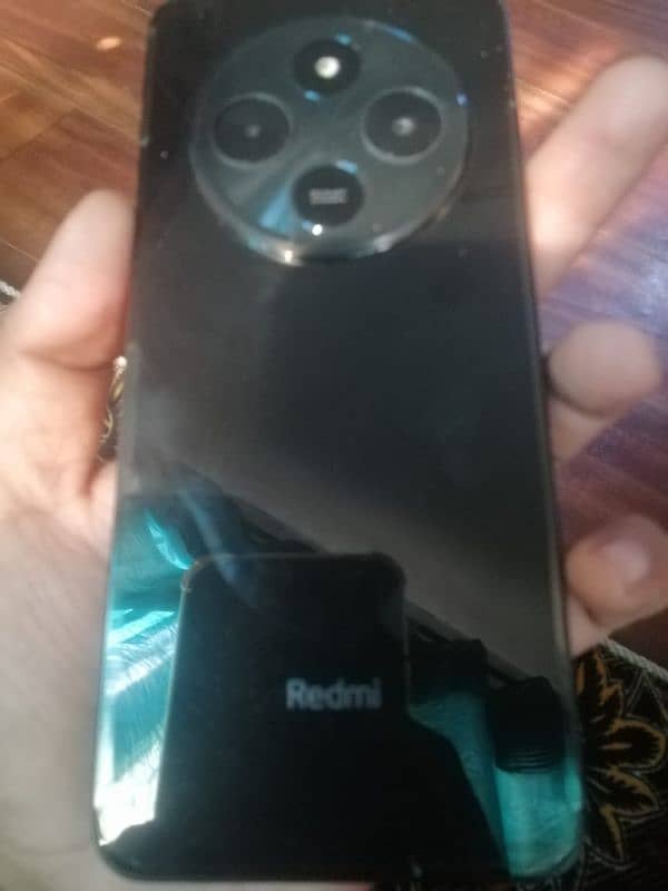 redmi mobil 14c 2 months used sale on OLX  6/128 with box charger 4