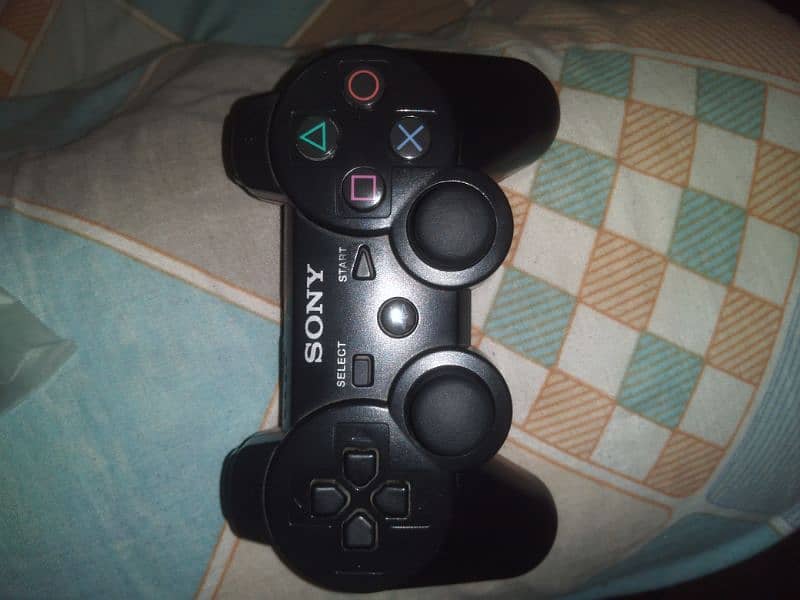 Playstation 3 with 2 wireless controllers jailbreaked 1