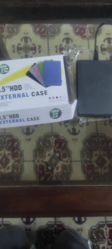 External Hard drive  + Hard disk case ( Brand new ) full of games 0