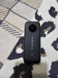 Insta 360 One x2 with Mic adaptor.