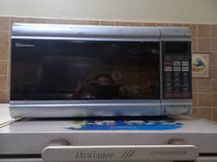 dawlance microwave jumbo size perfect in use and also in good rates