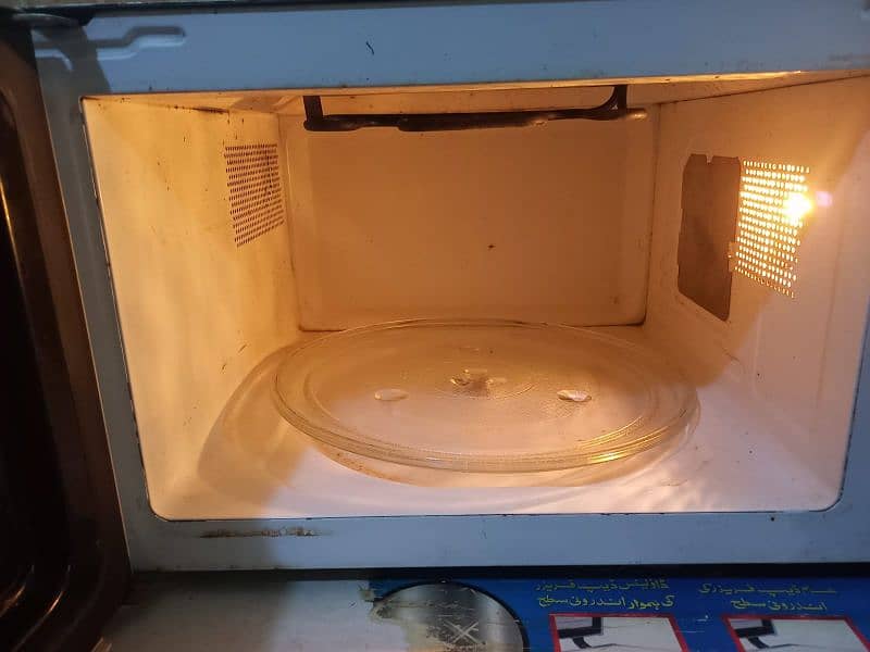 dawlance microwave jumbo size perfect in use and also in good rates 2