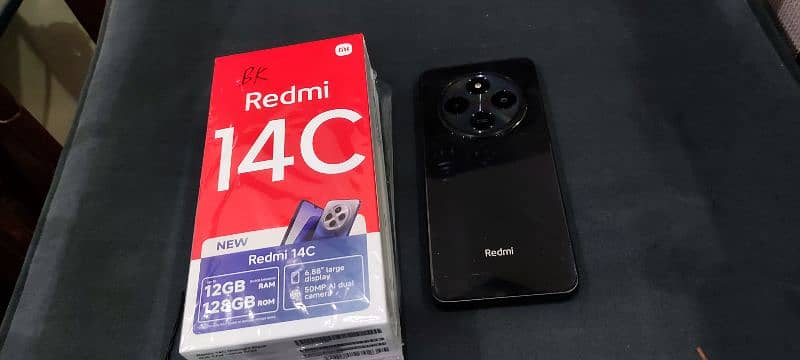 Redmi 14c just box open 12 months warranty 6