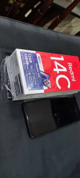 Redmi 14c just box open 12 months warranty 7