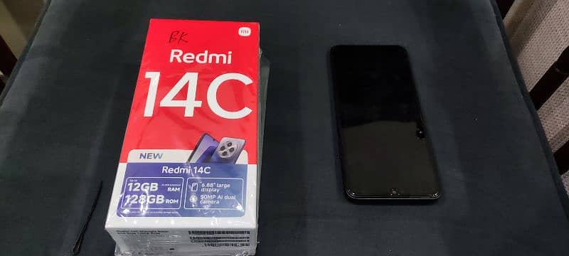 Redmi 14c just box open 12 months warranty 9