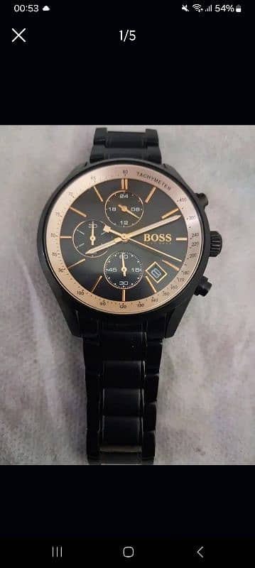 hugo boss it's a beautiful watch good condition only 2 week use 0