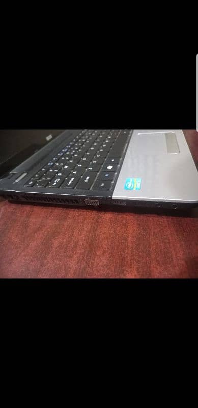 Asus E1-571 i3-4gb 15.5 inch 1