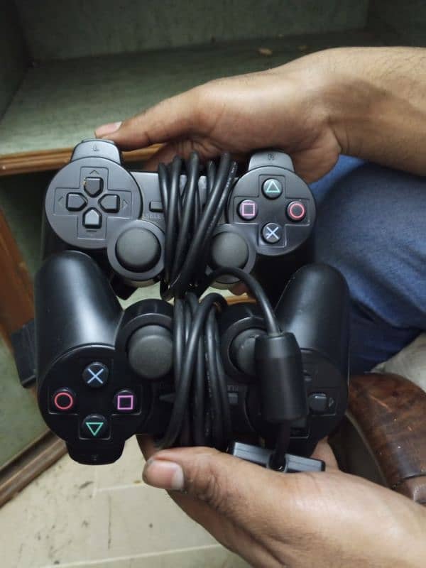 PS2 with 2 controllers  and hard drive 7