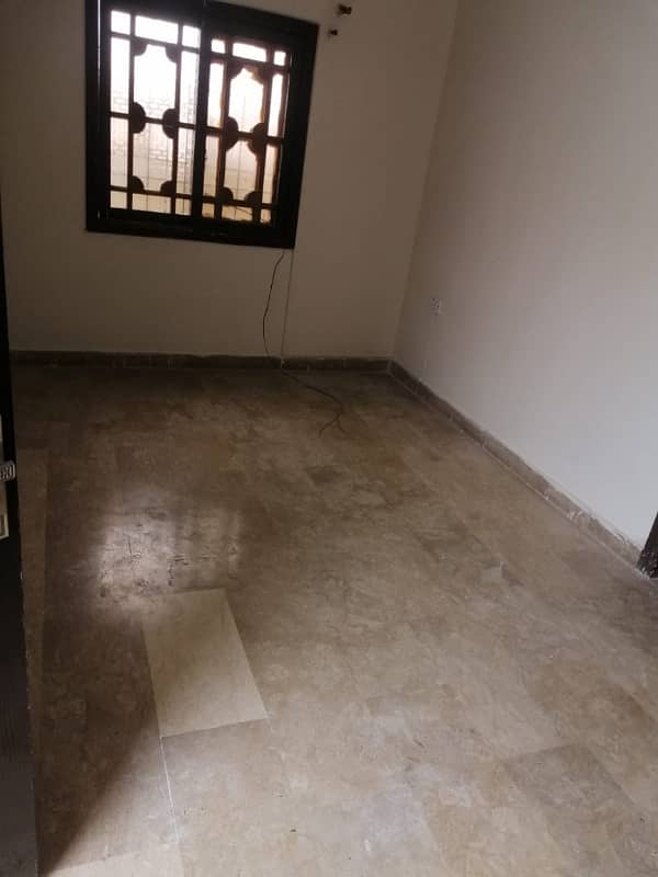 Brand new 2bed dd ground floor portion hansa society near safoora chowk 1