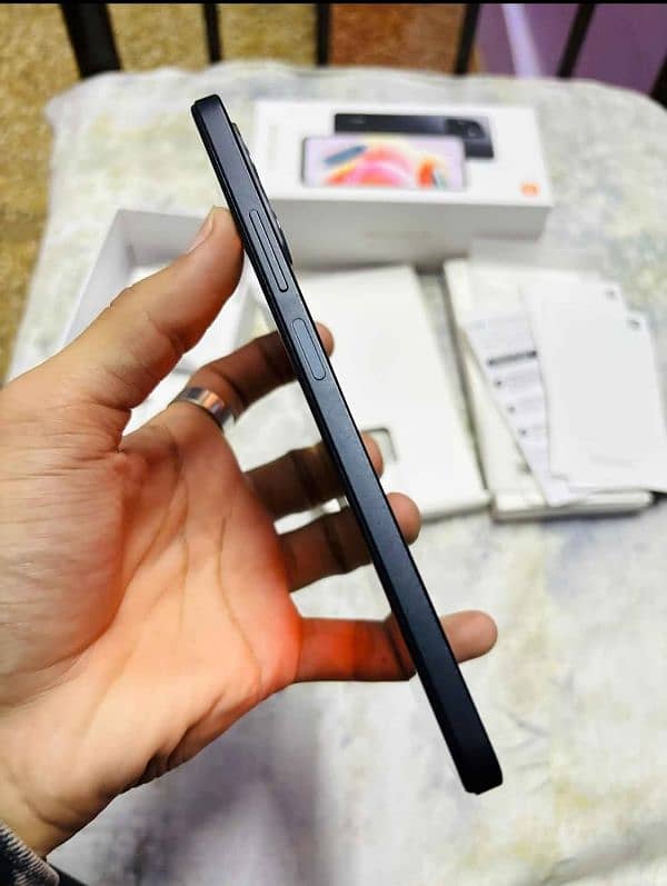 Redmi note 12  8/128 complete box 100% sealed all. ok hai 4